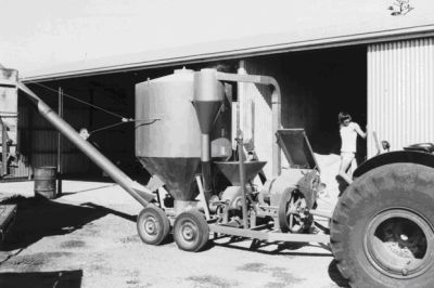 Figure 4, Photo 103733, On farm milling and mixing plant incorporating hammer and roller mill.