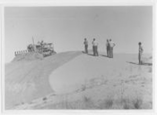 Bulldozing the crest off a dune prior to seeding – Mindarie 1956