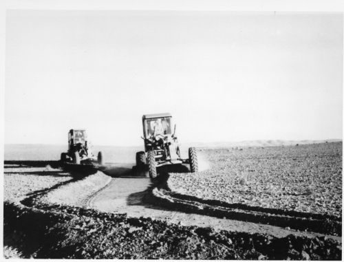 Constructing contour banks with a Booleroo plough in the 1960s.
