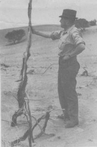 R.I. Herriot inspecting degraded farmland in 1940.