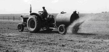 Figure 9, Photo 104920, Spreading pig effluent as valuable fertilizer.